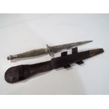 A second pattern WW2 Fairbairn-Sykes fighting knife (SAS knife) marked to the blade "The F-S