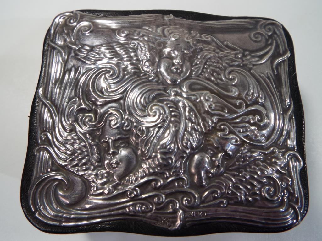 A leather covered trinket box with Britannia silver mounted lid with embossed decoration, - Image 2 of 2