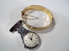An Ingersoll 7 jewel lever nurse's watch