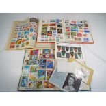 Three stamp albums containing UK and wor