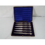 A cased set of six Edward VII fish knive