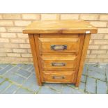 A good quality solid three drawer bedsid