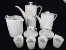 A ceramic coffee service comprising sixt