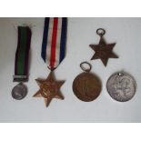 World War One and Two - two WW1 British campaign medals both inscribed to the rim 79605 Pte M