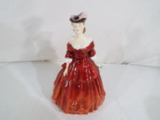 Royal Doulton - a Royal Doulton lady in a crinoline dress entitled Vivienne HN2073.