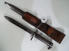 A Swedish model 1896 Mauser bayonet with metal scabbard and leather frog - NOTE: Please read