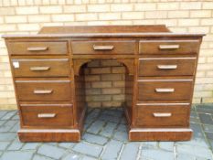 A good quality mahogany desk, approximately 85 cm x 126 cm x 54 cm.