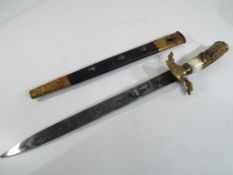 A German hunting dagger with horn handle.