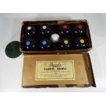 A good quality vintage Carpet Bowls game by Banda in original box.