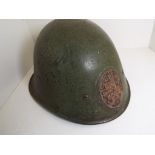 World War Two (WW2) - a Dutch / Netherlands steel helmet with neck protector and applied plaque to