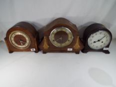 Three mantel clocks, one Bakelite cased by Enfield with Arabic numerals to the dial,
