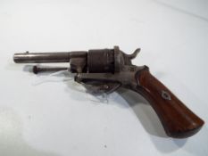 An antique late 19th / early 20th century Belgian pin fire double action six shot revolver pistol.