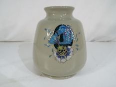 Moorcroft Pottery - a large bulbous vase by Moorcroft Pottery in the Bursting Bubbles pattern,