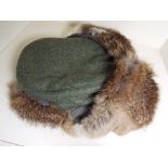World War Two (WW2) - a German Army winter fur hat with badge,