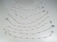 A collection of eight silver bracelets