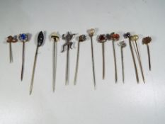 A collection of antique stick pins.