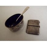 A hallmarked silver salt with blue glass liner and a hallmarked silver stamp case [2]