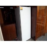 A large Bush upright fridge,