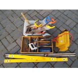 A quantity of hand tools to include saws, pliers, screwdrivers,