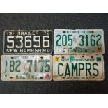 Four American US vintage automobile number plates,