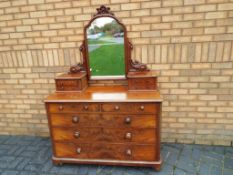 A good quality oak dressing table with mirror, three over two 170 cm (h) x 120 cm x 56 cm.