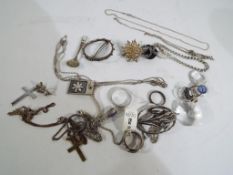 A collection of mostly silver jewellery to include rings, pendants, brooches,