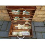 Notaphily - a wooden chest containing a quantity of World War Two period and later banknotes