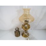 A brass oil lamp with glass shade and other (2)