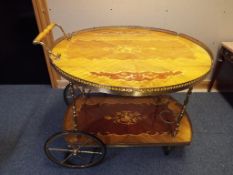 A vintage Italian marquetry two tier drinks trolley Est £40 - £60