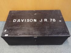 A wooden chest with hinged lid marked to the lid Davison J.R.