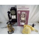 A 1950s style diner phone classic American payphone with push button dial,