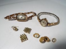 A 9ct gold wristwatch with a 9ct gold expandable bracelet and a further bracelet marked Regent and