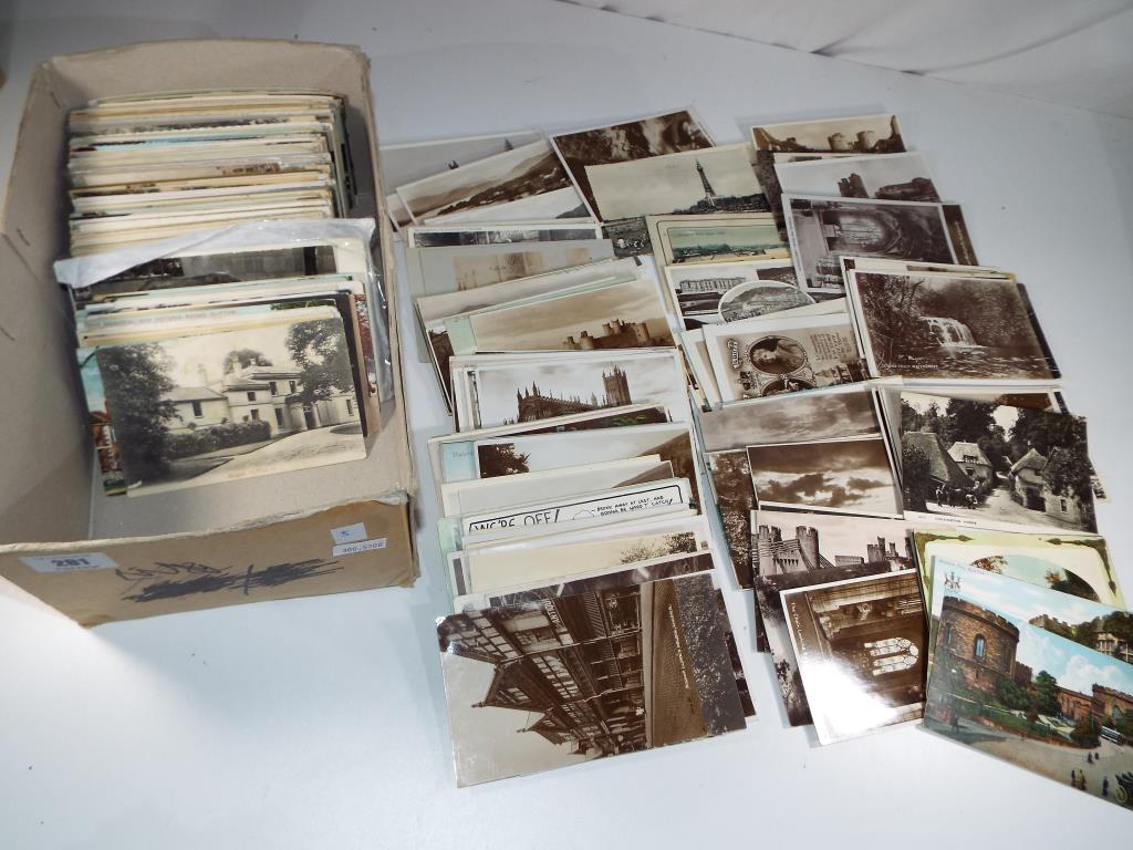 In excess of 400 early period UK topographical postcards to include real photos,