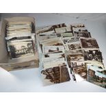 In excess of 400 early period UK topographical postcards to include real photos,