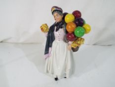 Royal Doulton - a Royal Doulton figurine entitled Biddy Penny Farthing stamped to the base,