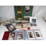 A collection of postcards in six albums including foreign topographical,