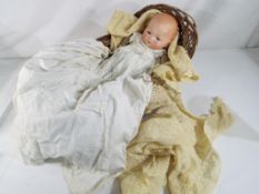 Armand Marseille Doll - a bisque headed doll, bald head, sleeping blue eyes, closed mouth,