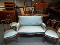 An Edwardian salon carved settee and three matching chairs Est £150 - £200 (one a/f)