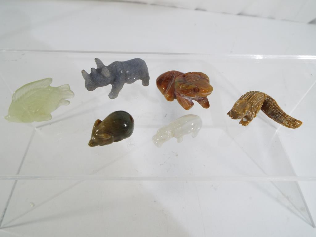 A collection of six stone animals