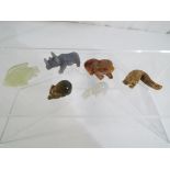 A collection of six stone animals