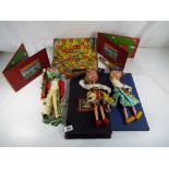 Three vintage Pelham Puppets with various vintage unboxed board games to include Grand National
