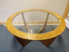 A good quality G Plan circular glass table,