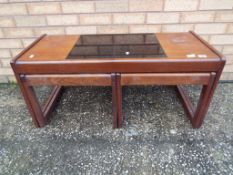 A 1970s style nest of three tables, appr