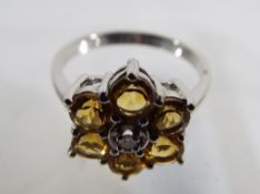 A lady's 9 carat white gold, citrine and