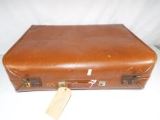 A good quality vintage leather suitcase.