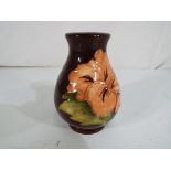 Moorcroft Pottery - A small vase in the