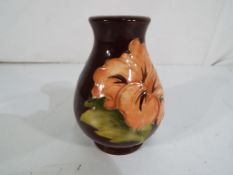 Moorcroft Pottery - A small vase in the