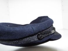 A black sailor's peaked cap, the banding