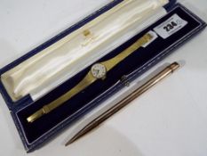 A Mappin and Webb lady's 17 jewel wristwatch in original box and a rolled gold propelling pencil