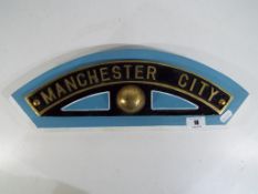 A replica cast brass Manchester City Football Club nameplate, based on British Rail train No.